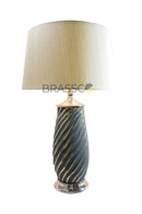 Decorative pair of ceramic table lamps with smooth finish for contemporary home lighting.