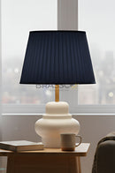 Pair of white metal surahi-shaped table lamps designed for modern bedside and home interior lighting.